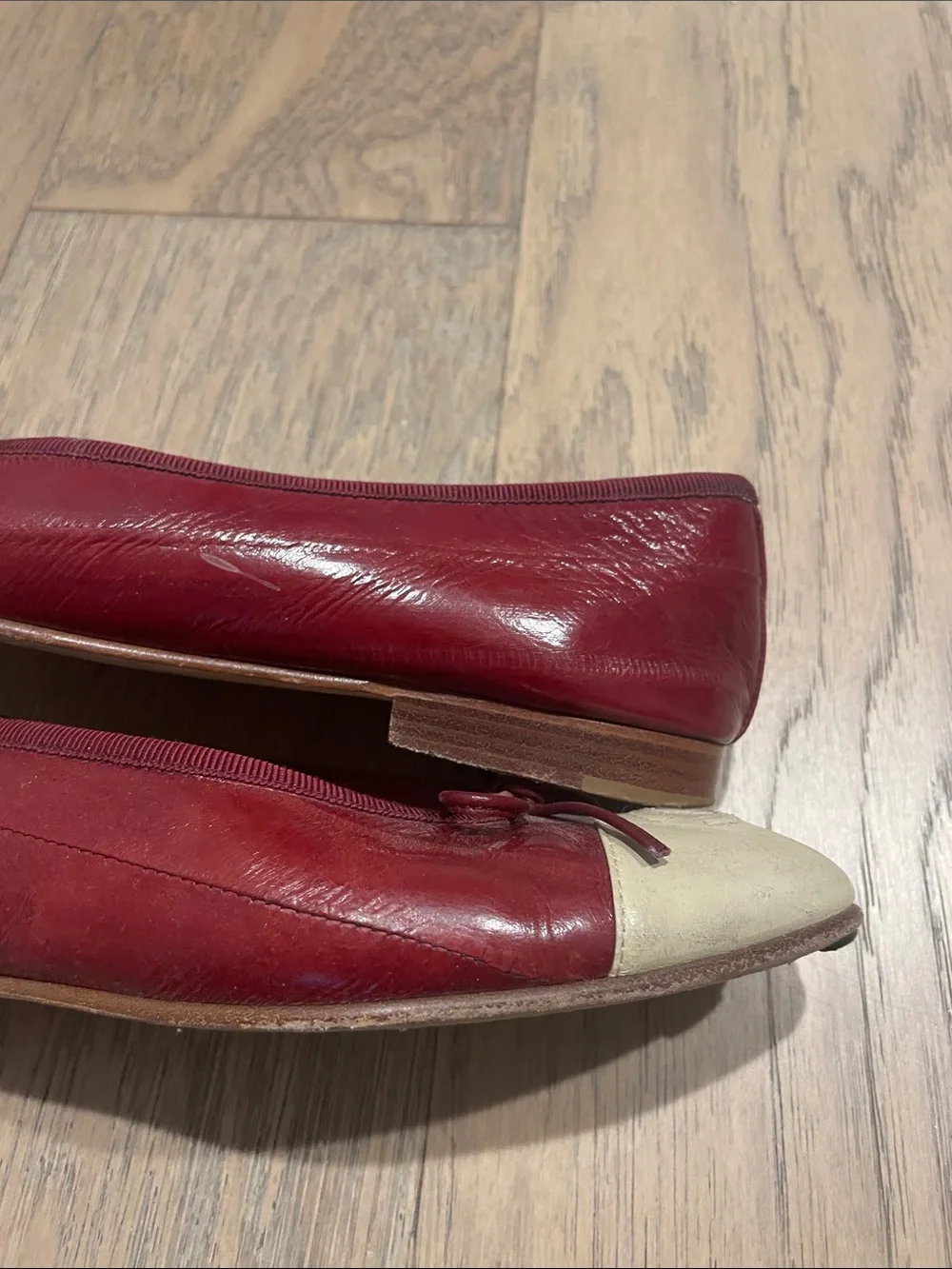 CHANEL Burgundy Eel Skin and Cream Cap-Toe Ballet Flats